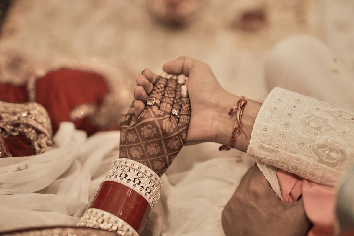 Indian wedding ceremony with marigold and rose decor